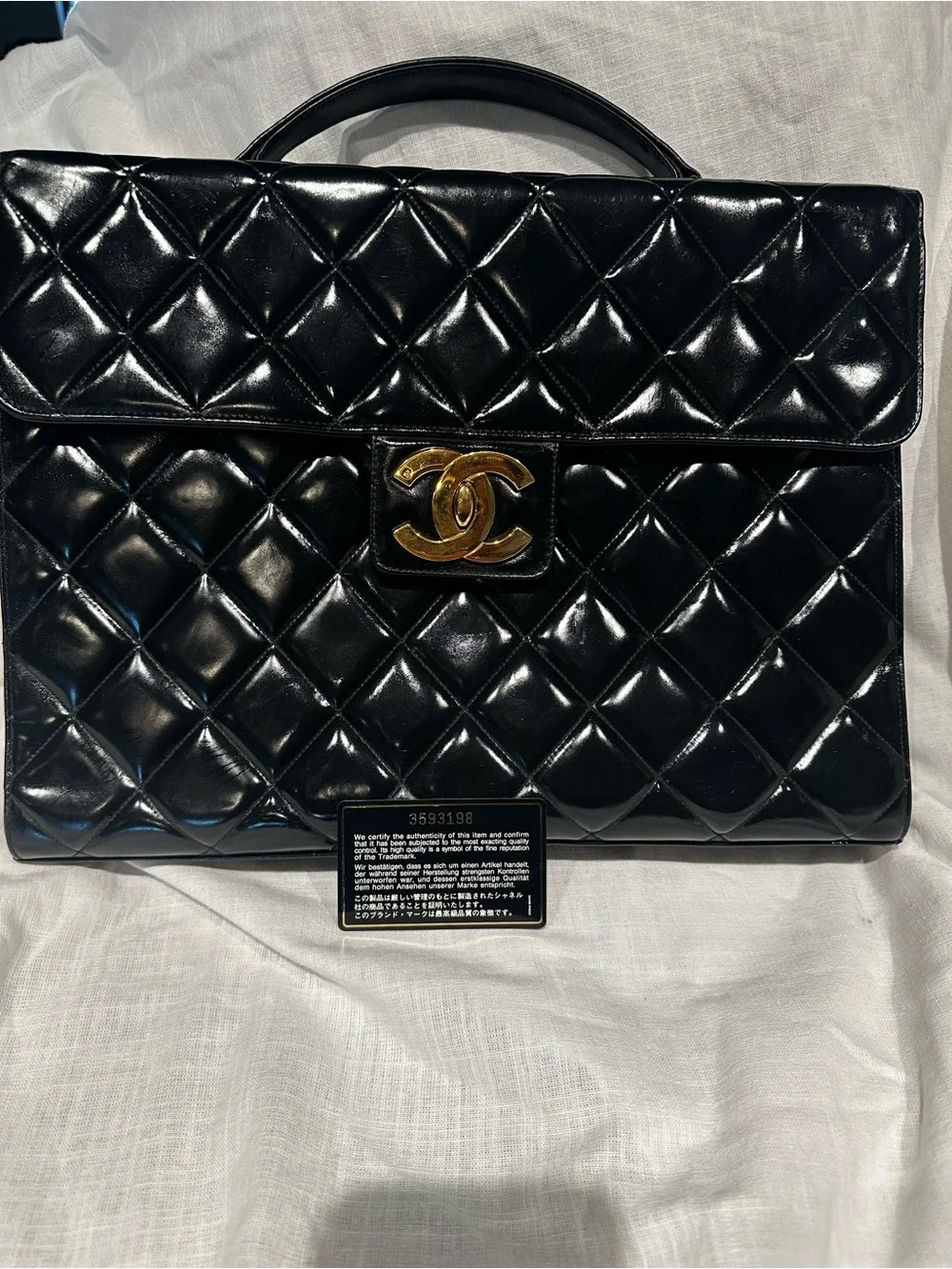 CHANEL Black Quilted Patent Top Handle Satchel with Gold CC